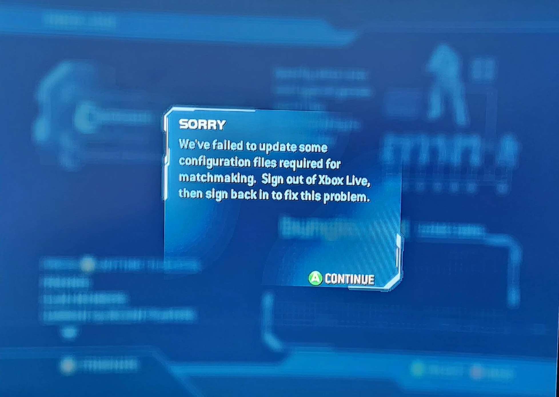 A screenshot of Halo 2, displaying a pop-up message titled 'Sorry', with the text 'We've failed to update some configuration files required for matchmaking. Sign out of Xbox Live, then sign back in to fix this problem.'